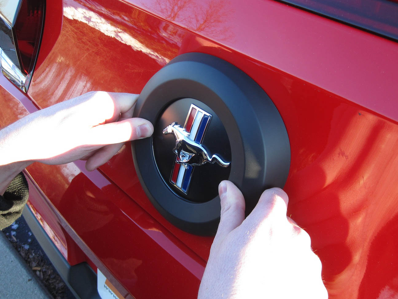 How To Install A Mmd Trunk Emblem Surround On Your 2010 2017 Once The Cover Is Properly Aligned Press Down Firmly Around Edges To Fully Seat Tape