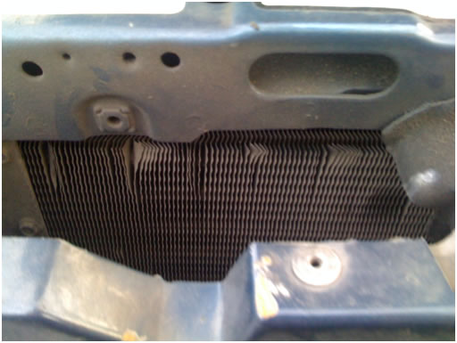 Old and dirty foxbody mustang radiator